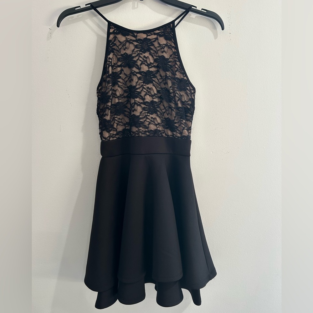 Emerald Sundae black and tan with floral halter dress.